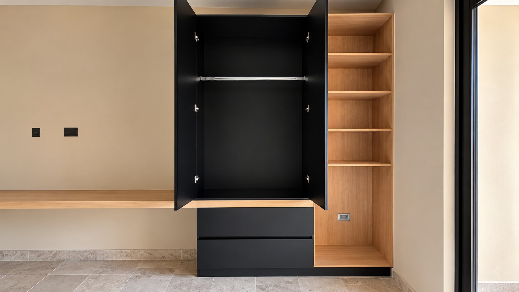 Clóset negro abierto con tubo para colgar, cajones y librero lateral de madera