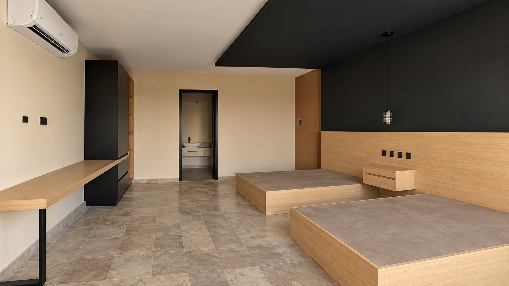Otra habitación doble con cabecera de madera y muro negro, escritorio corrido y clóset negro junto al baño